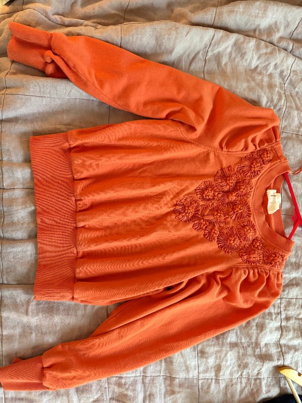 Anthropologie red/orange embroidered sweater